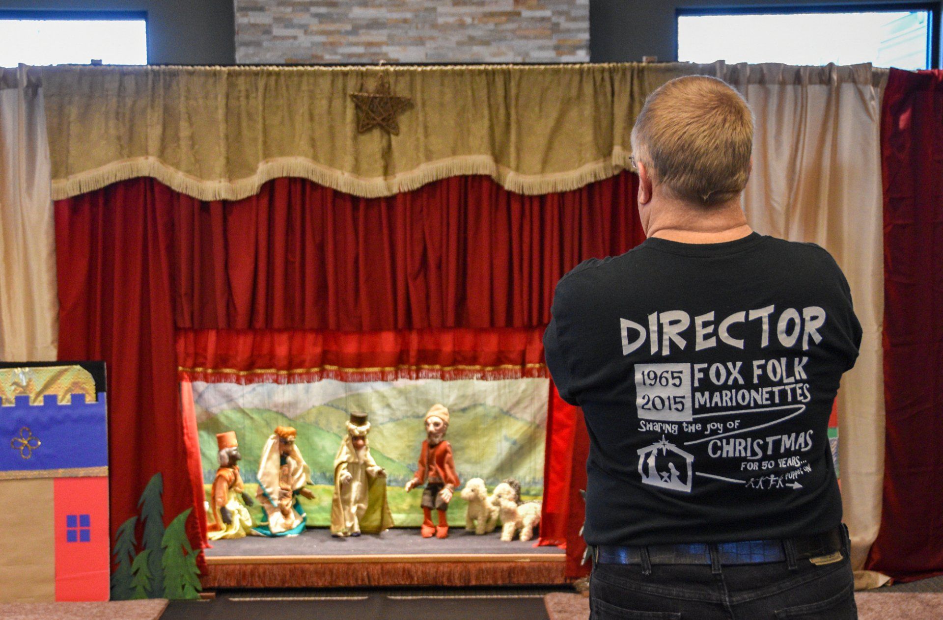 Mr. Dave in his Director's shirt watching practice