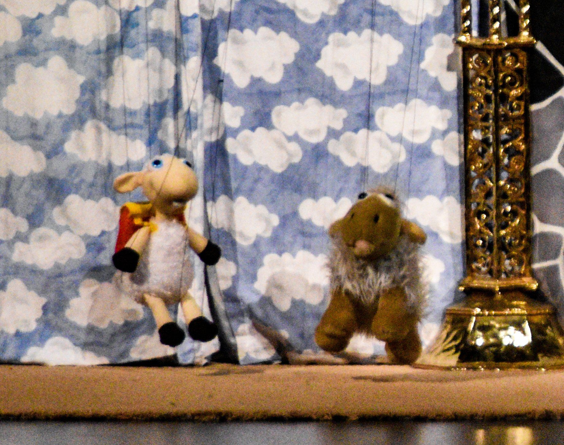 marionette sheep narrates the opening of the show