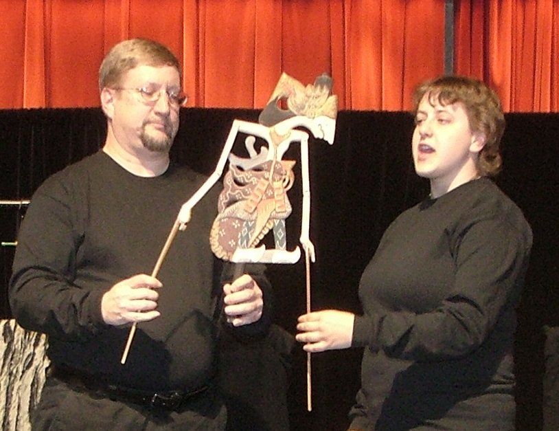 Mr Dave and Miss Cassie demonstrate an Indonesian shadow puppet