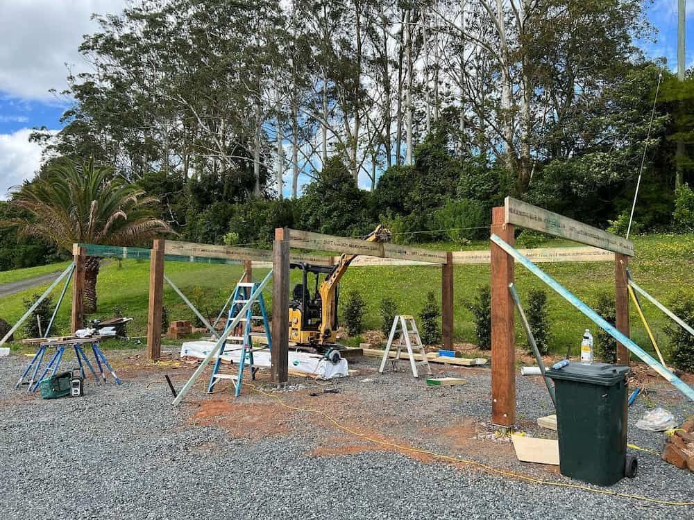 A Wooden Structure is Being Built in a Gravel Area With Trees in the Background — Norcoast Diggers in Ballina, NSW
