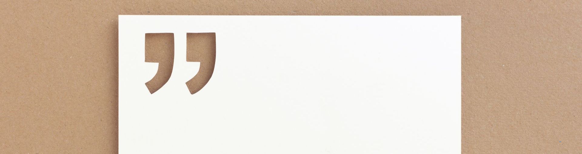 a piece of paper with a quote cut out