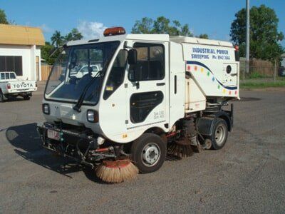 White Power Sweeper Truck Parked In A Lot — Industrial Power Sweeping Services Pty Ltd In Knuckey Lagoon, NT