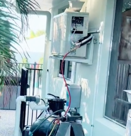 Wiring Of An Air Conditioner On A Brick Wall — Law Air Conditioning In Annandale, QLD
