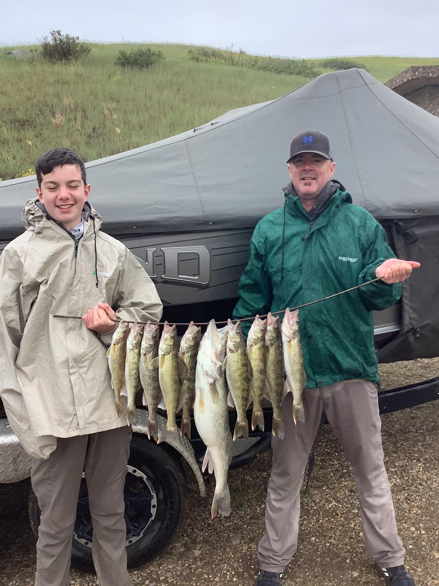 South Dakota Walleye Fishing, father and son with the day's catch