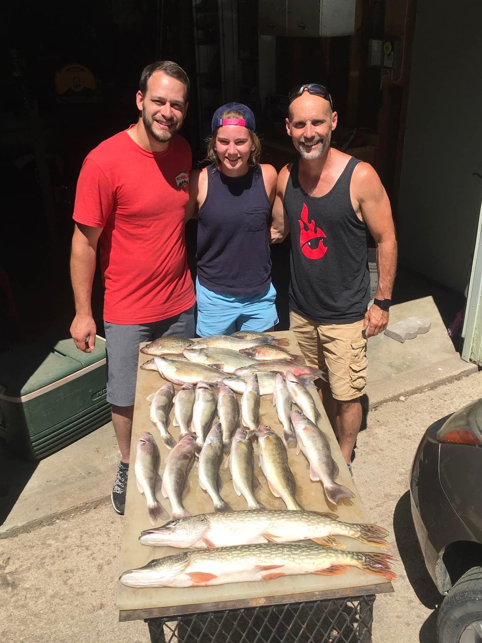 Family with day's catch from Lake Thompson, SD