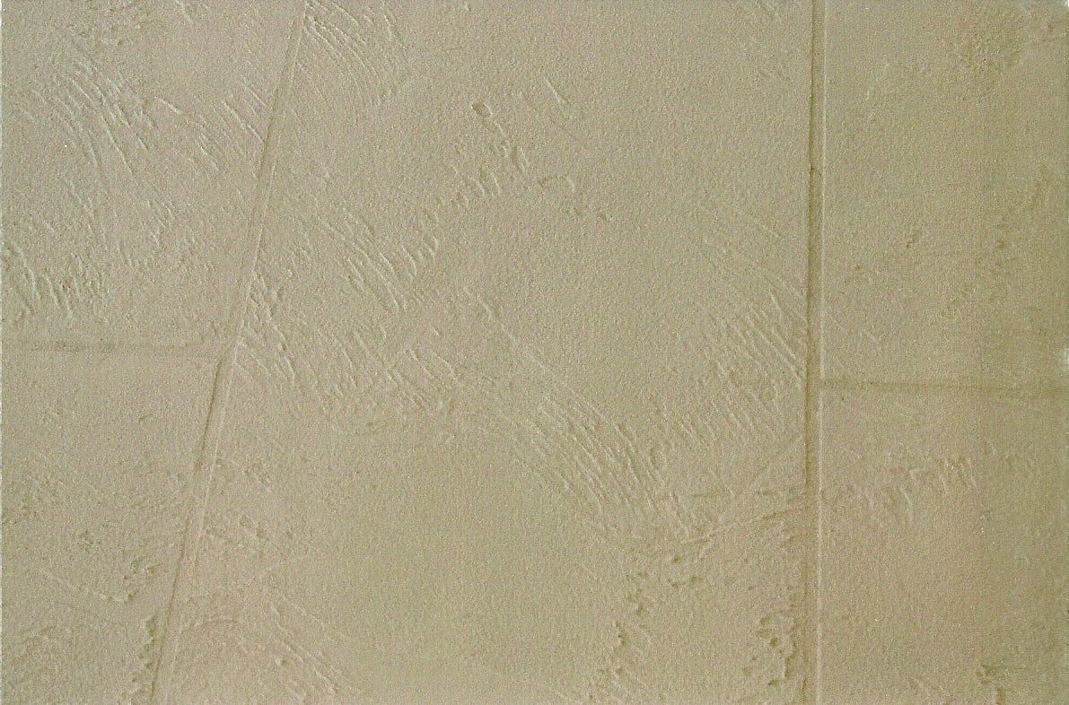 Beige textured wall with a vertical line on the right.