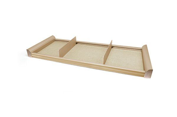 A wooden tray with three dividers on a white background.