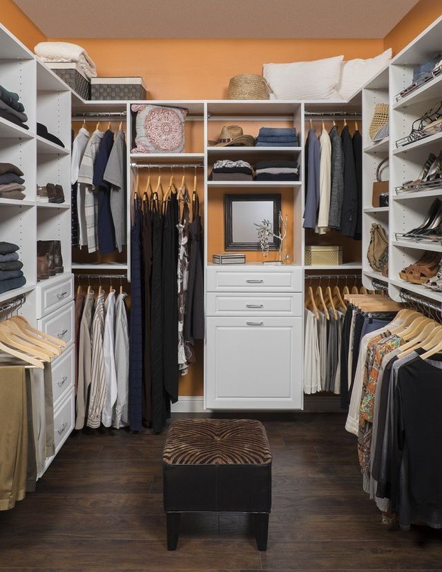 Small Walk-in Closet with White Raised Panel