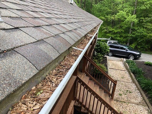 Gutter Before Removing The Leaves — Henrico, VA — Central Virginia Power Washing