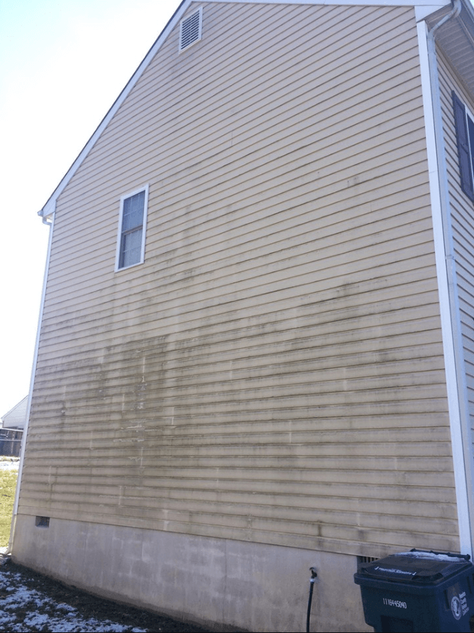 Porch Power Washing — Washing Wall of the House Before Power Washing oin Kents Store, VA