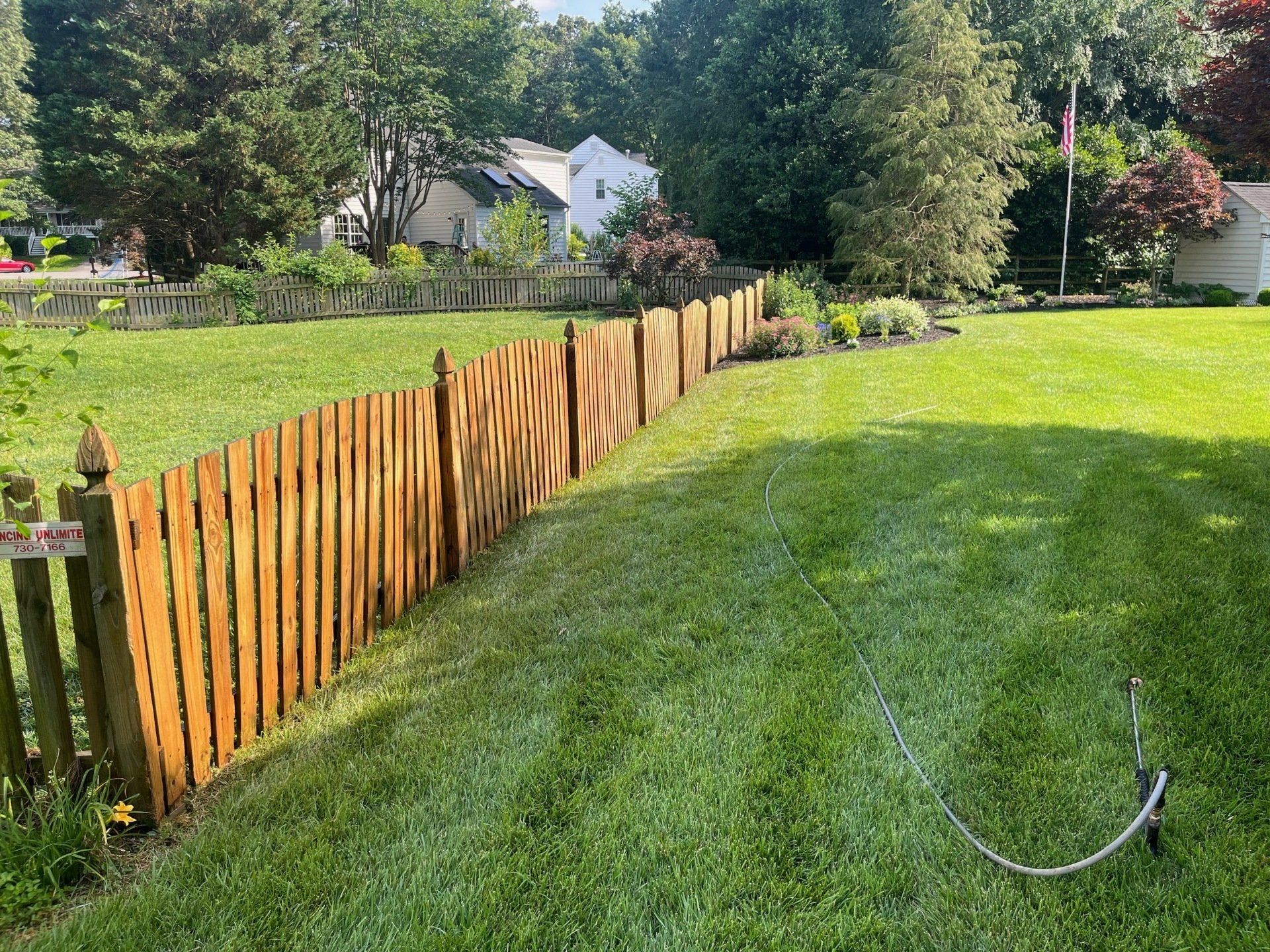 cleaned new look old wood fences with green algae