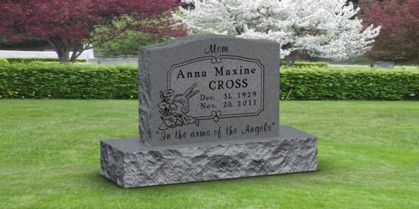 A gravestone for anna maxine cross in a cemetery.
