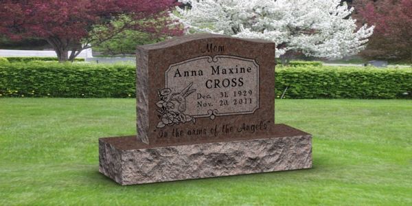 A gravestone for anna maxime cross is sitting in the middle of a lush green field.