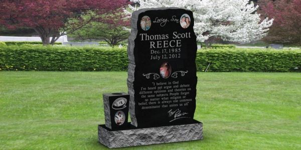 A gravestone for thomas scott reece in a cemetery.