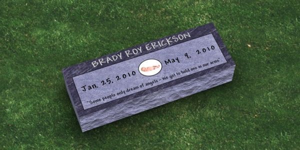 A black gravestone with the name ashliptubbi on it