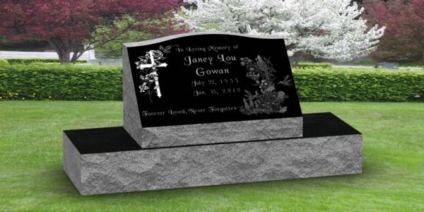 A black gravestone in a cemetery with the name allen on it.