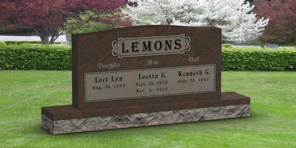A gravestone in a cemetery with the name lemons on it