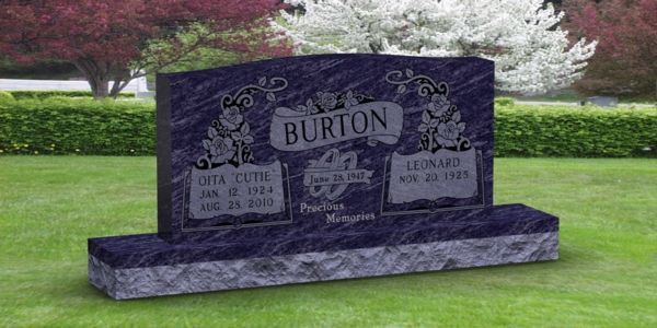 A purple gravestone with the name burton on it is in a cemetery.