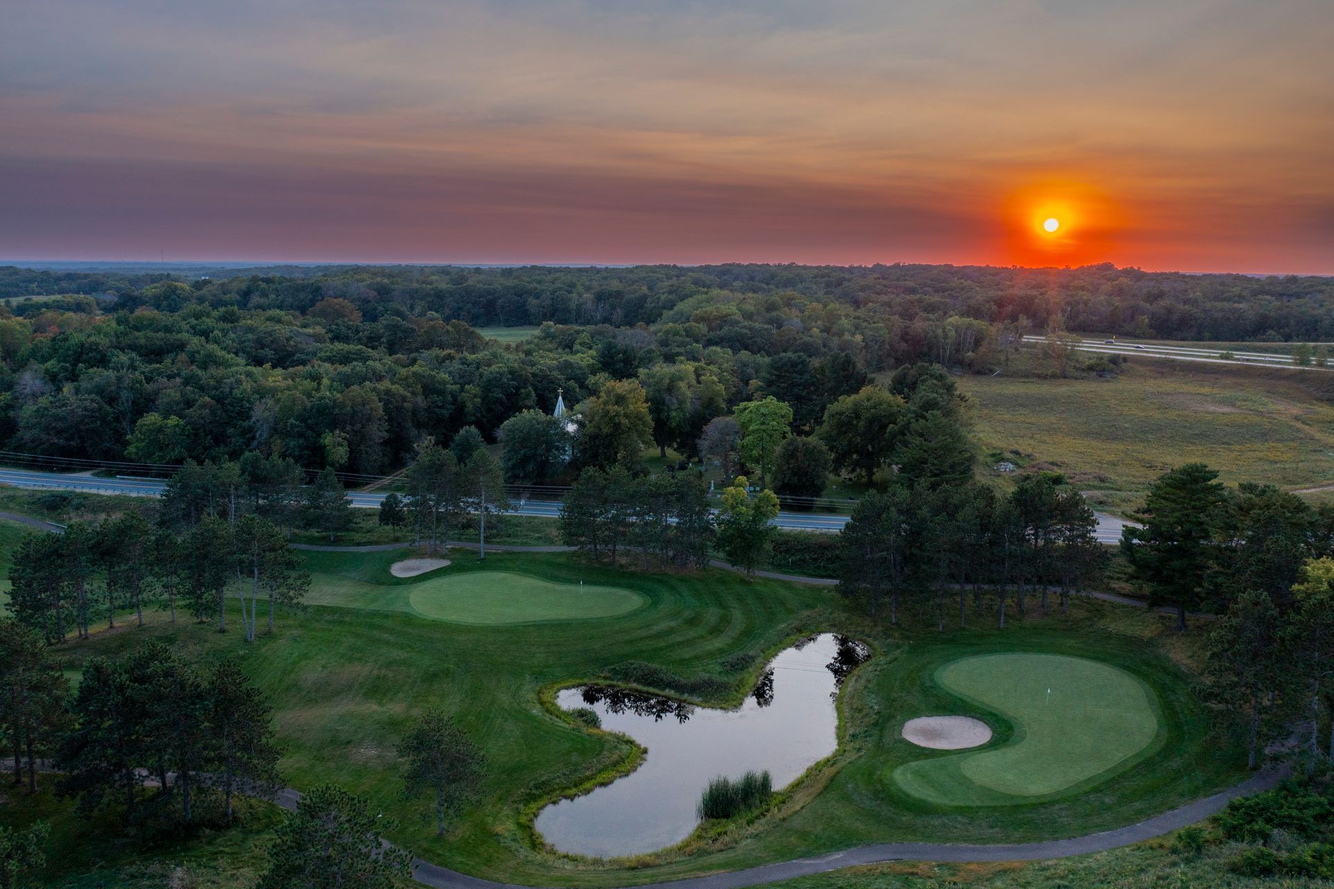 An image of the course with the sunsetting
