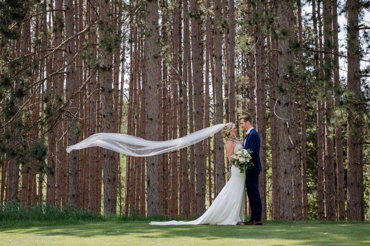 Wedding couple photo in the woods.