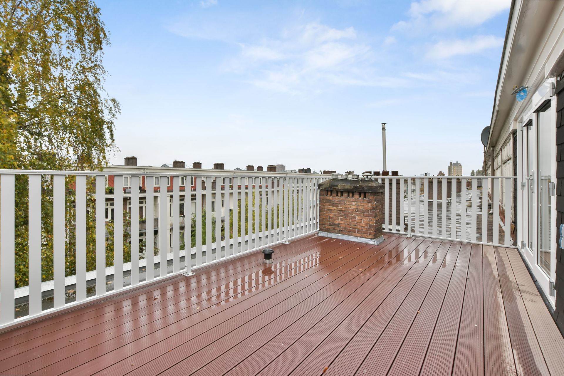 wooden deck with an open view