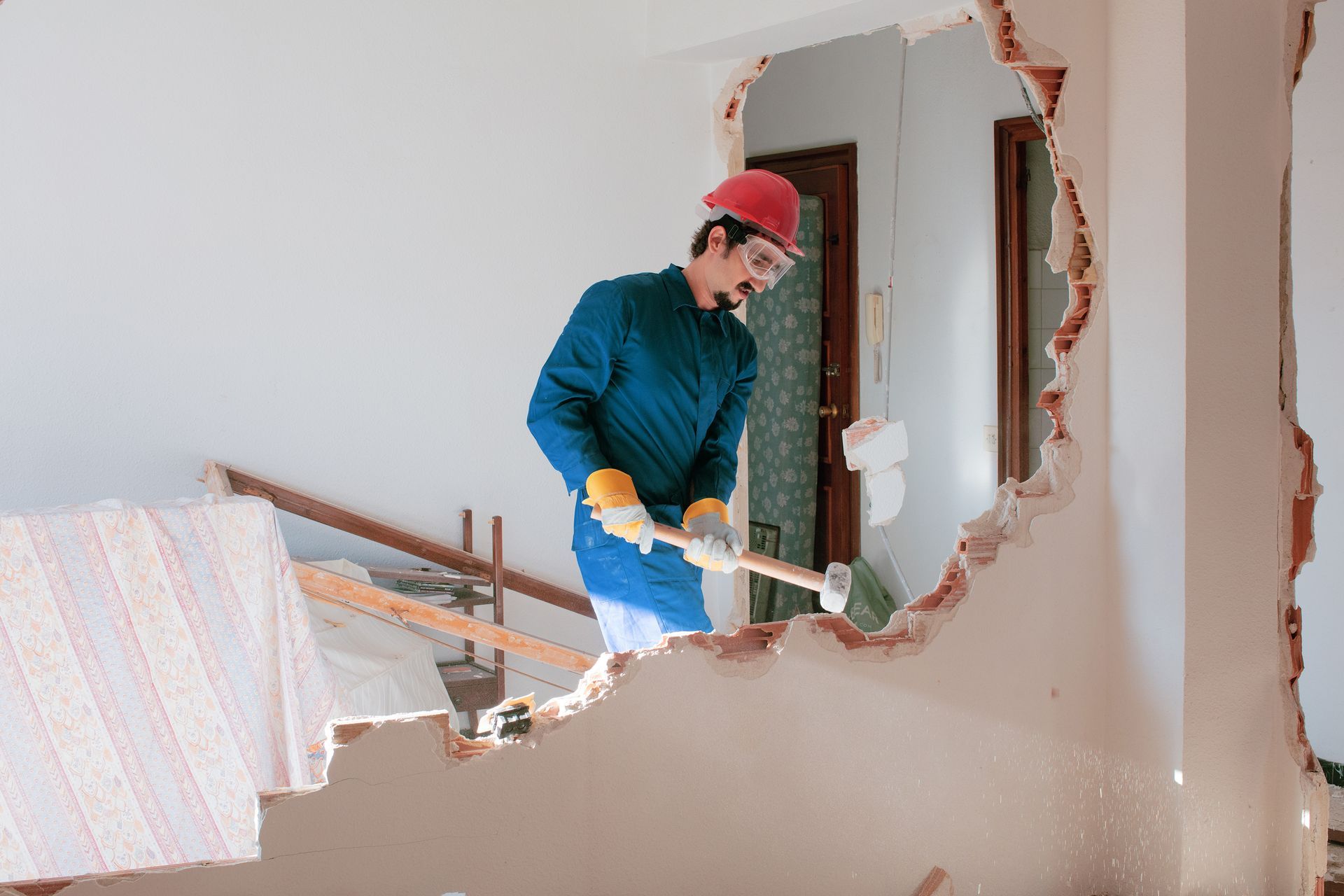 construction worker remodeling a space