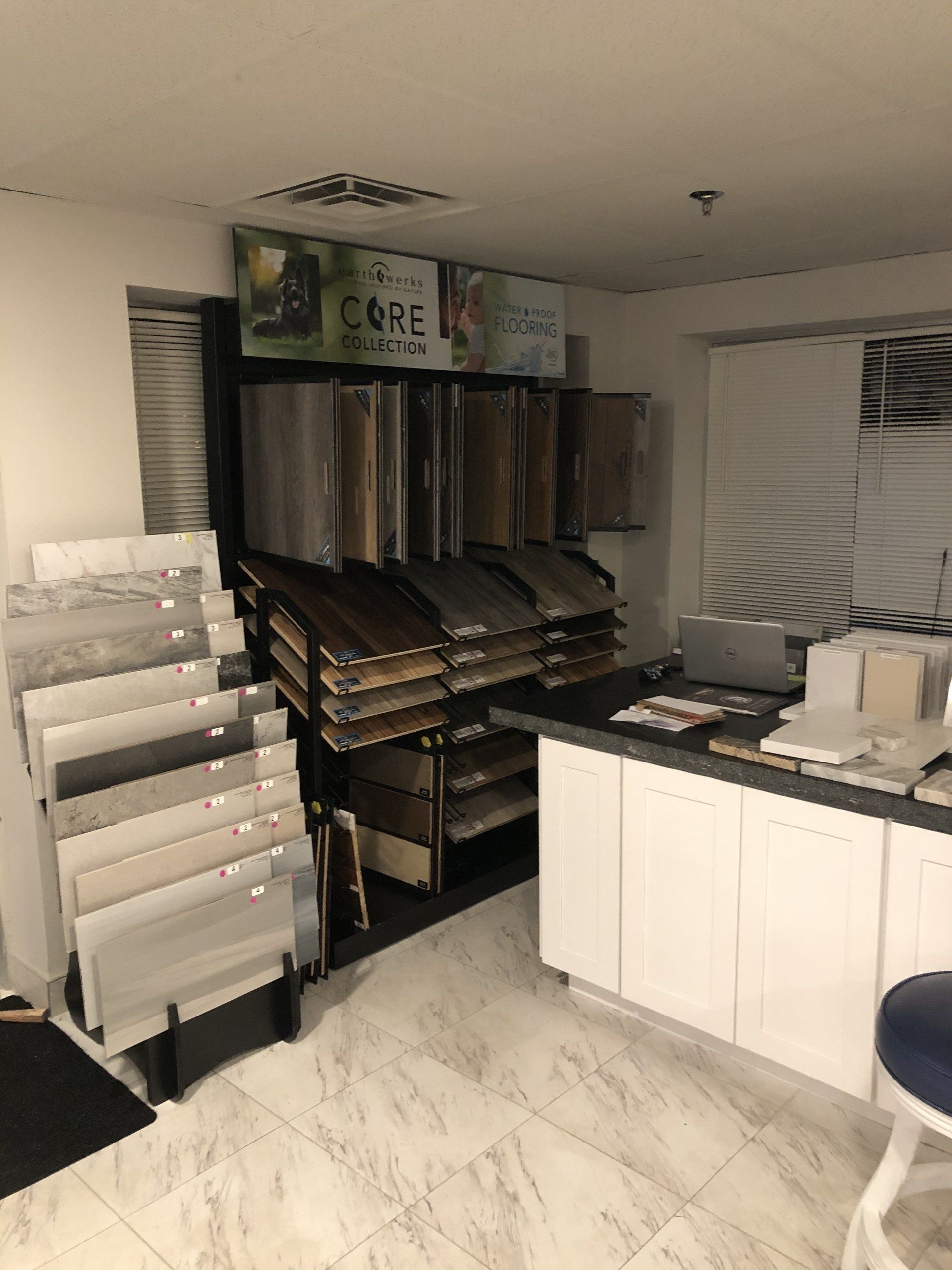 A showroom with a lot of different types of flooring on display