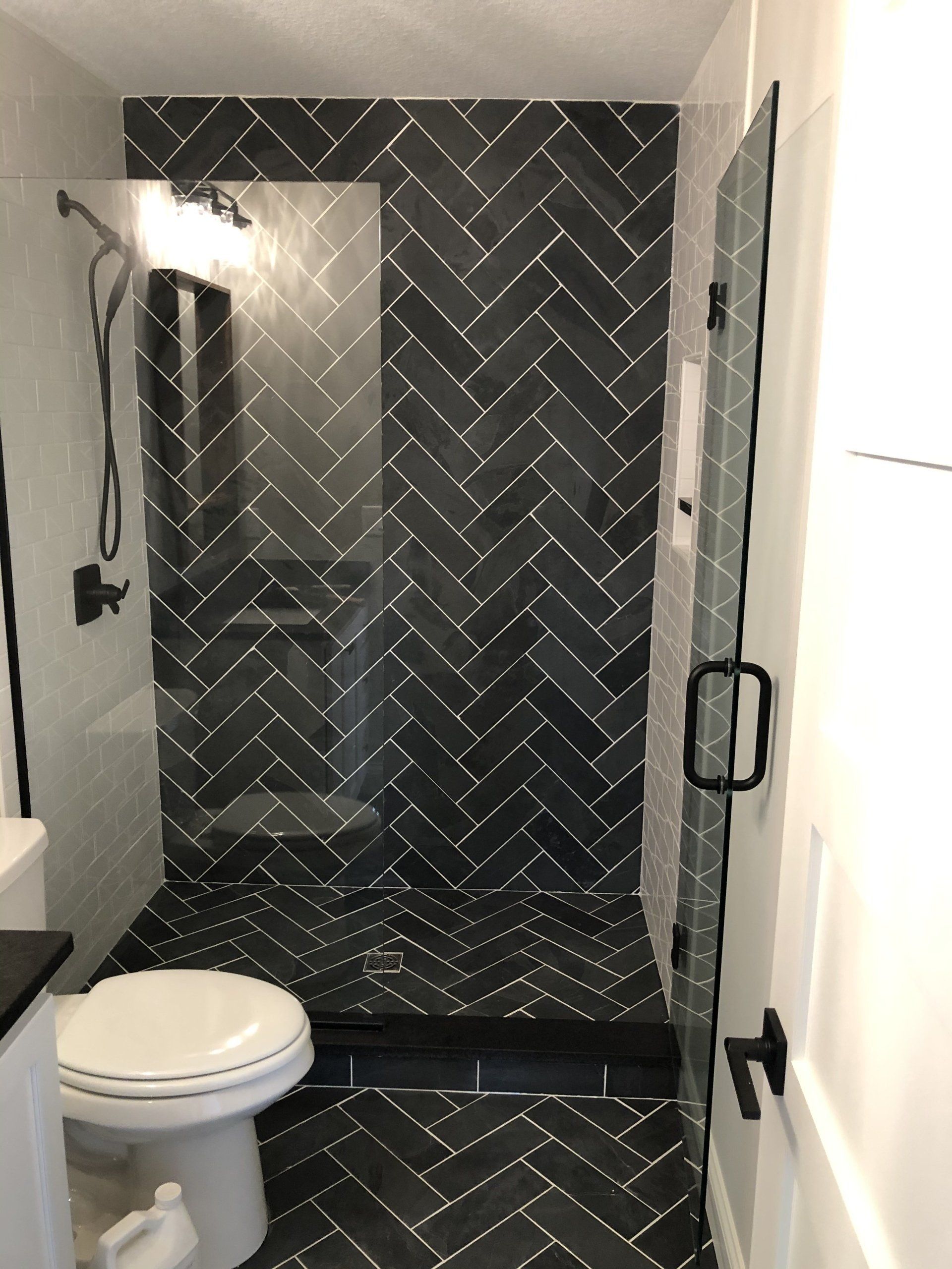 Elderly bathroom remodel | A bathroom with a toilet and a walk in shower