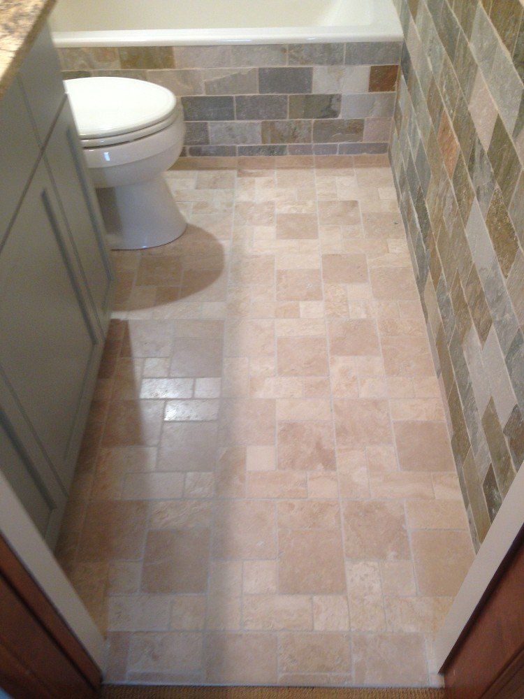 A bathroom with a sink and bathtub.