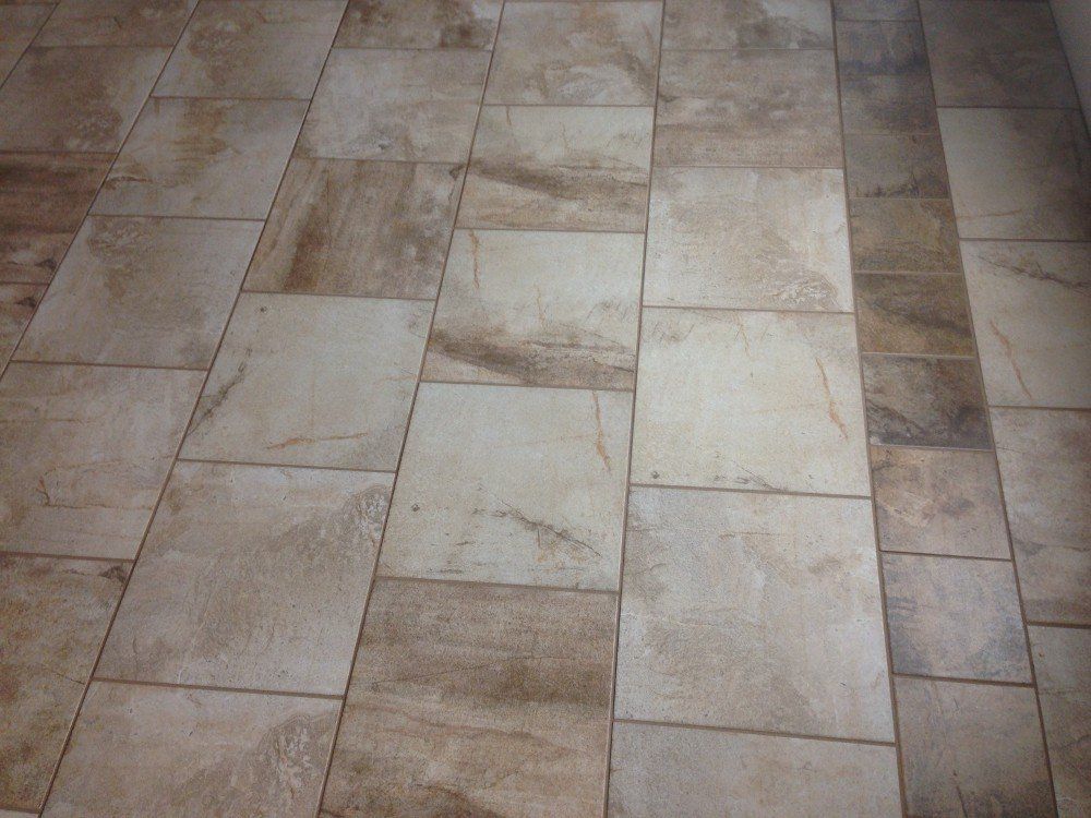 A close up of a tiled floor in a room