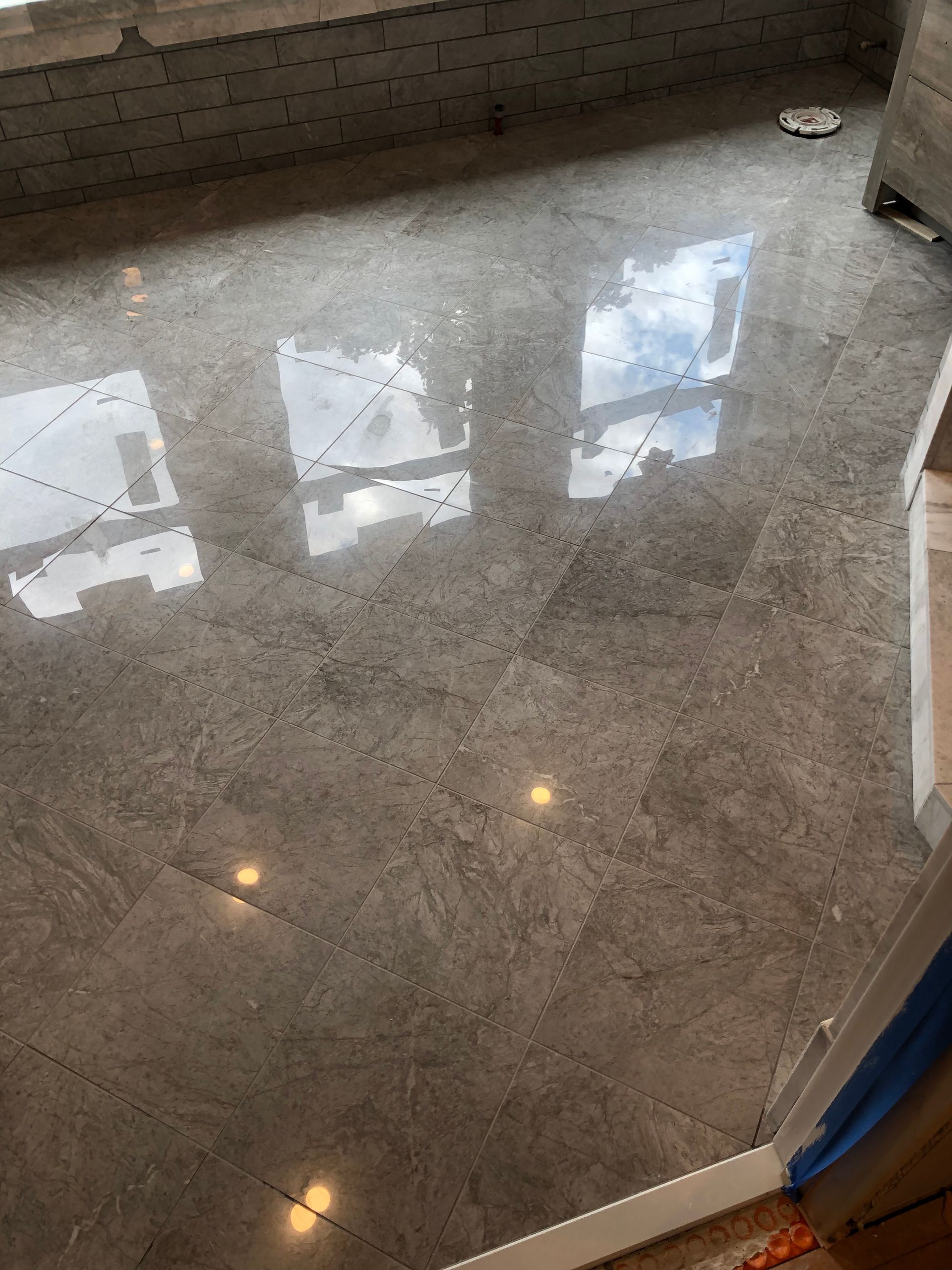 Tile floor contractor work | marble floor in a room.