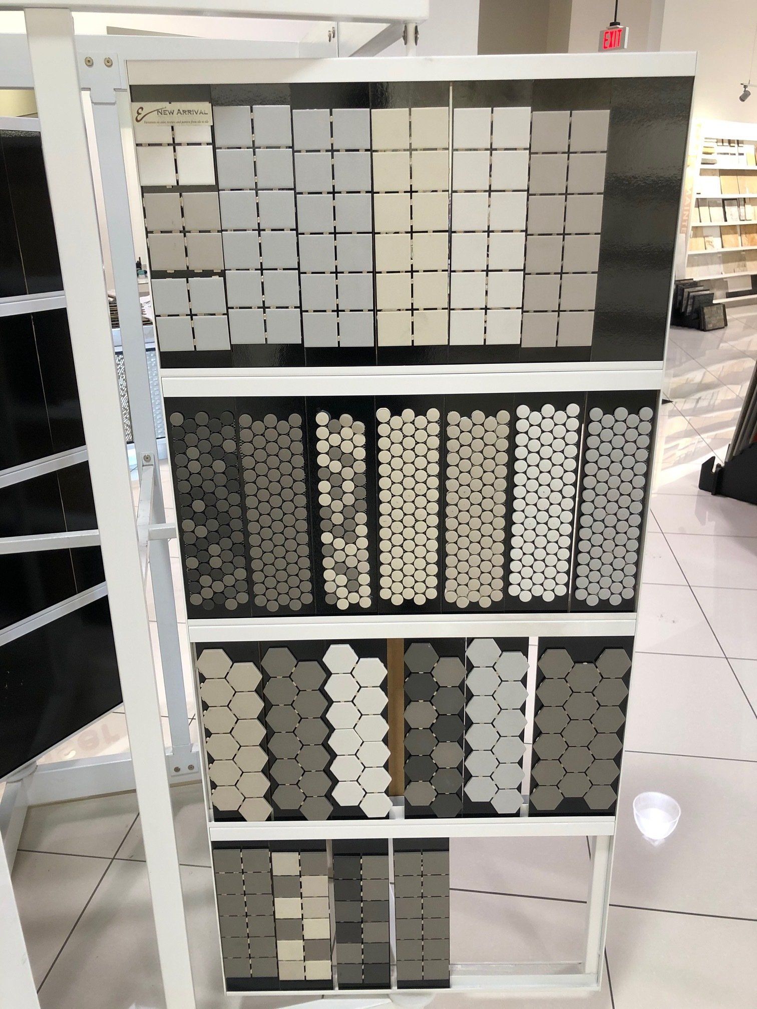 A display of tiles on a rack in a store