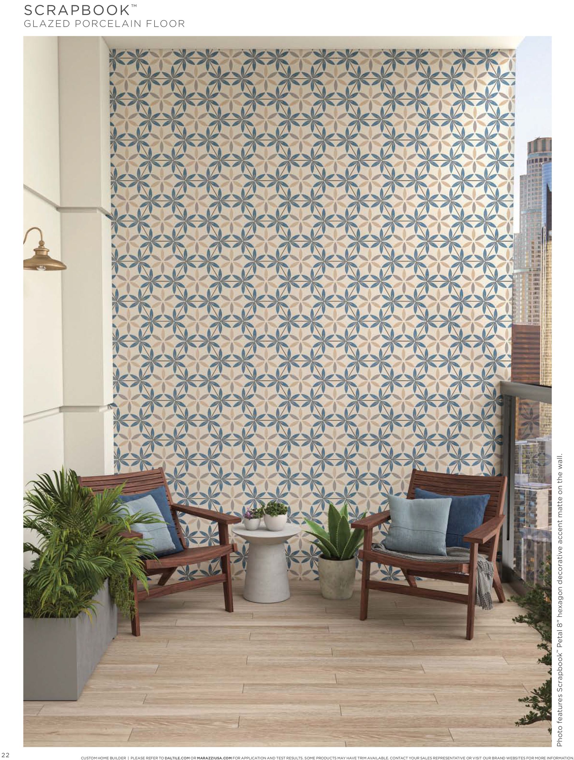 Custom tile wall | A balcony with two chairs and a table with a pattern on the wall.