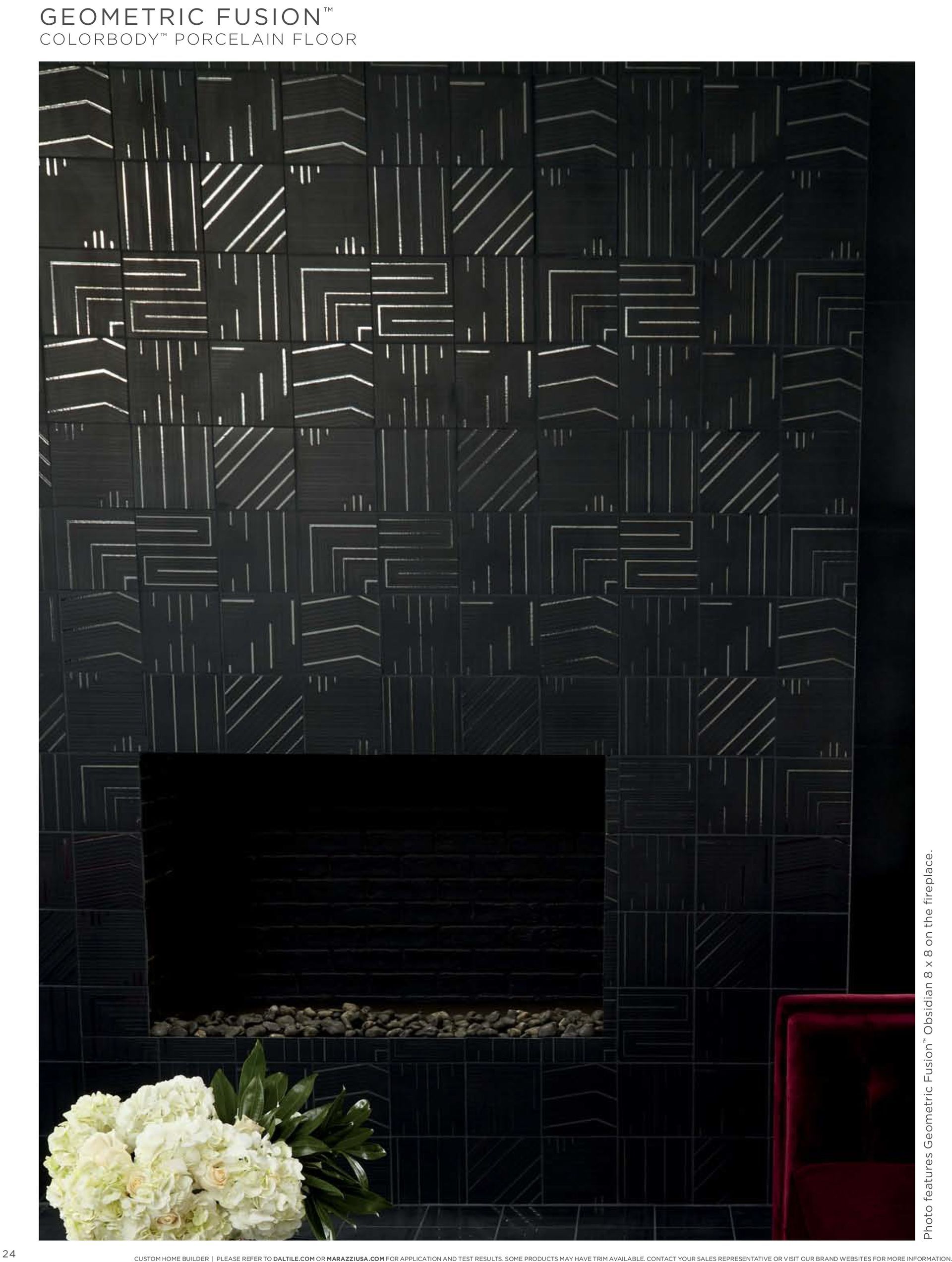 A living room with a fireplace and a black wall