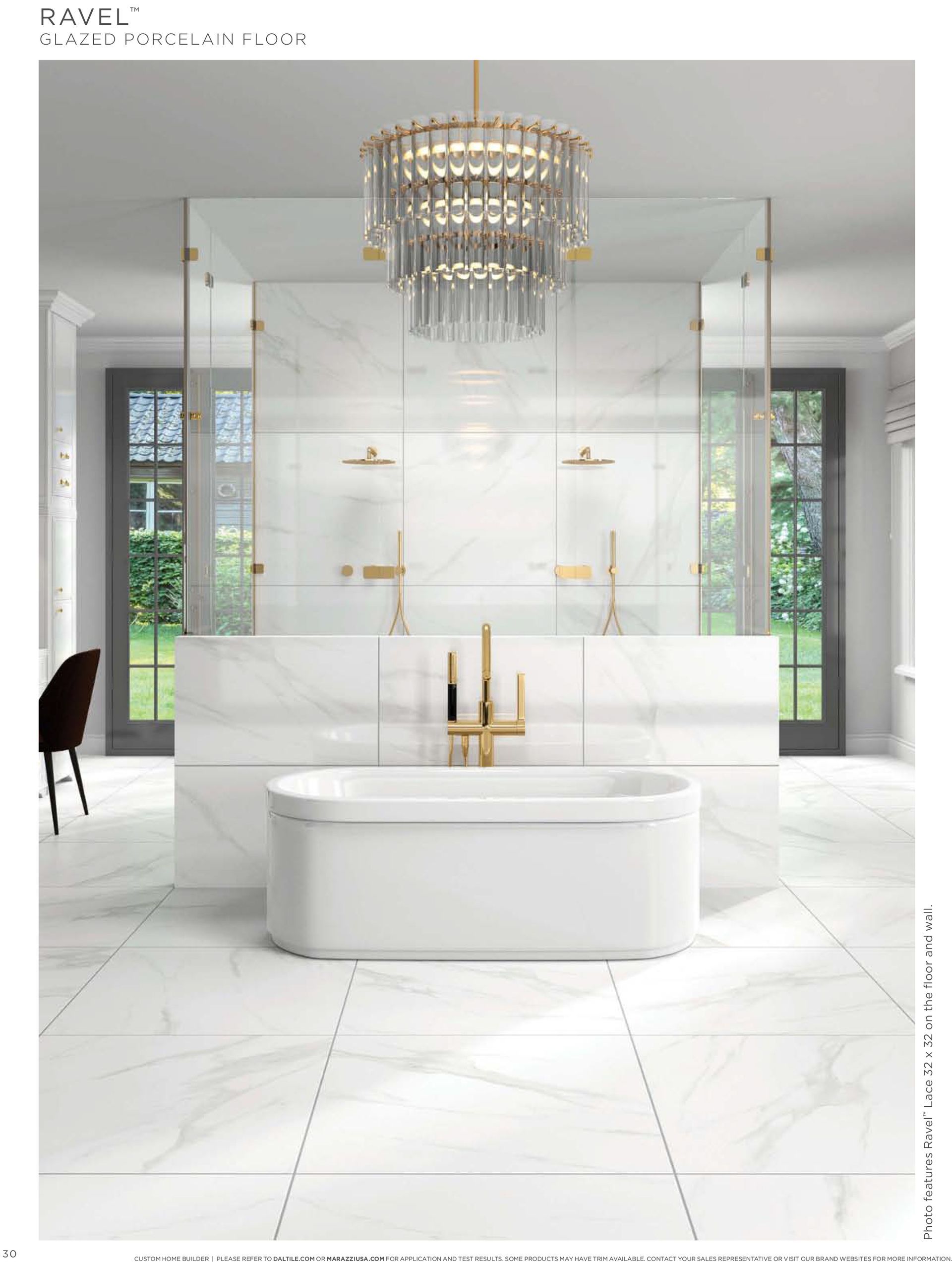 Luxury bathroom renovation | A bathroom with a bathtub , shower , and chandelier.