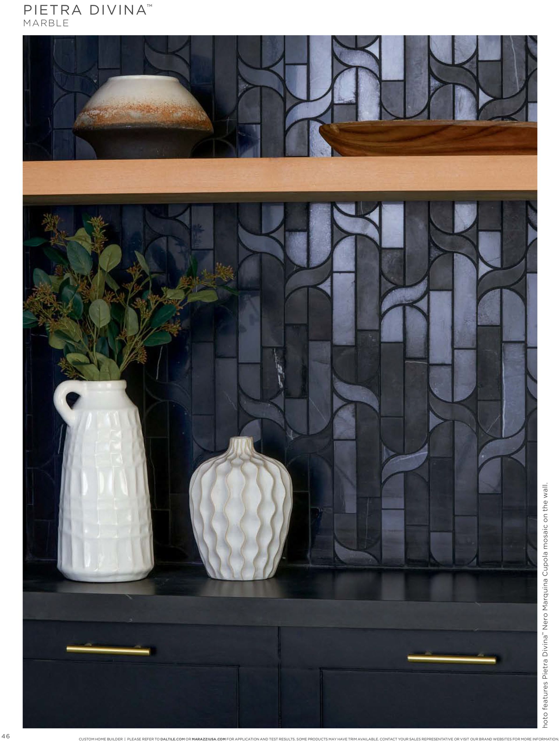 Luxury tiling |  A shelf with two vases and a bowl on it.