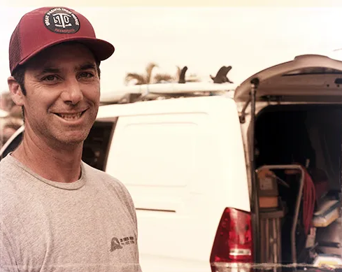 Wooden Staircase, Hardwood Floor, Stone Wall, and Accent Lighting — CM Timber Flooring in East Ballina, NSW