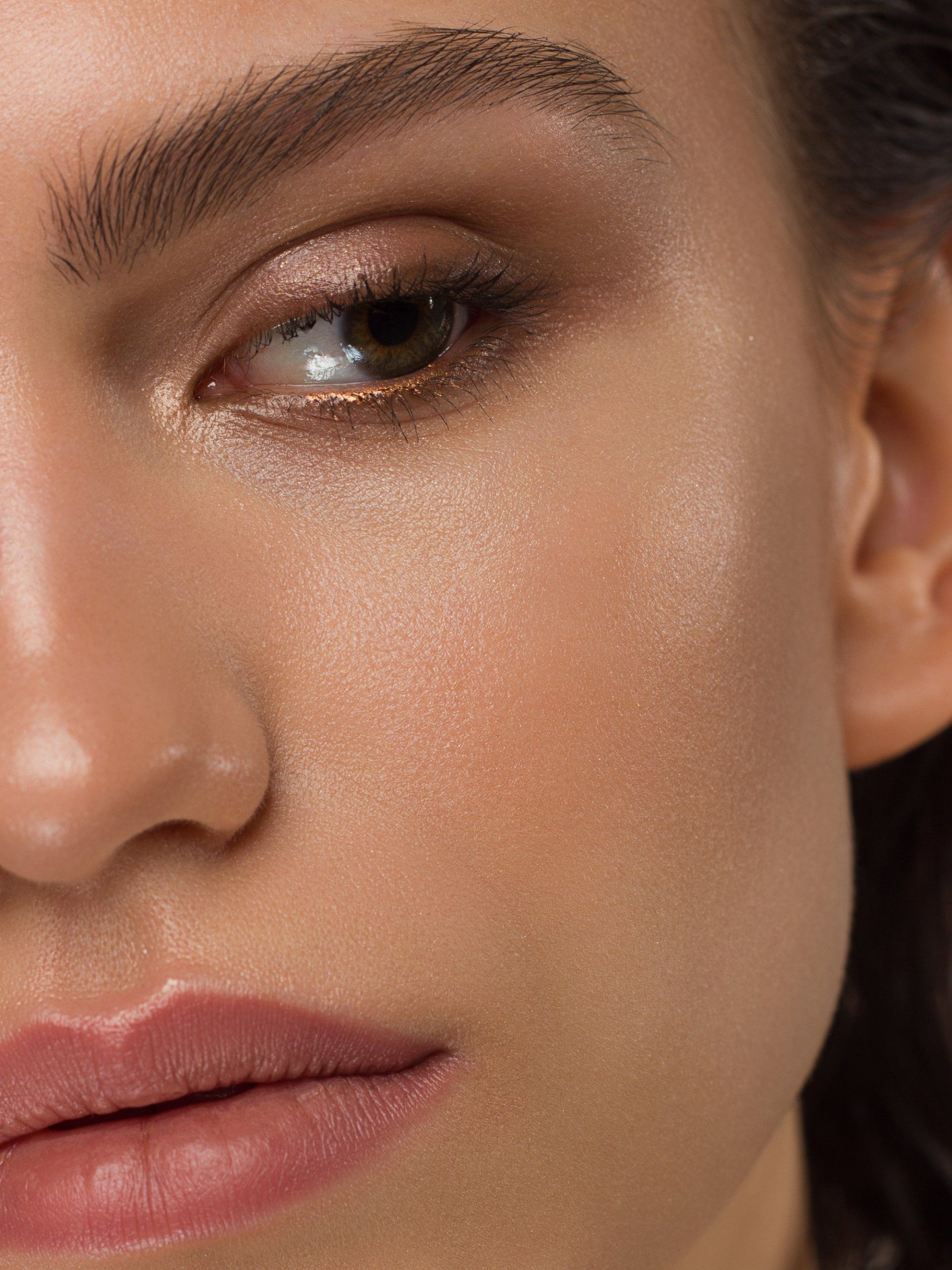 closeup of woman's face with smooth skin