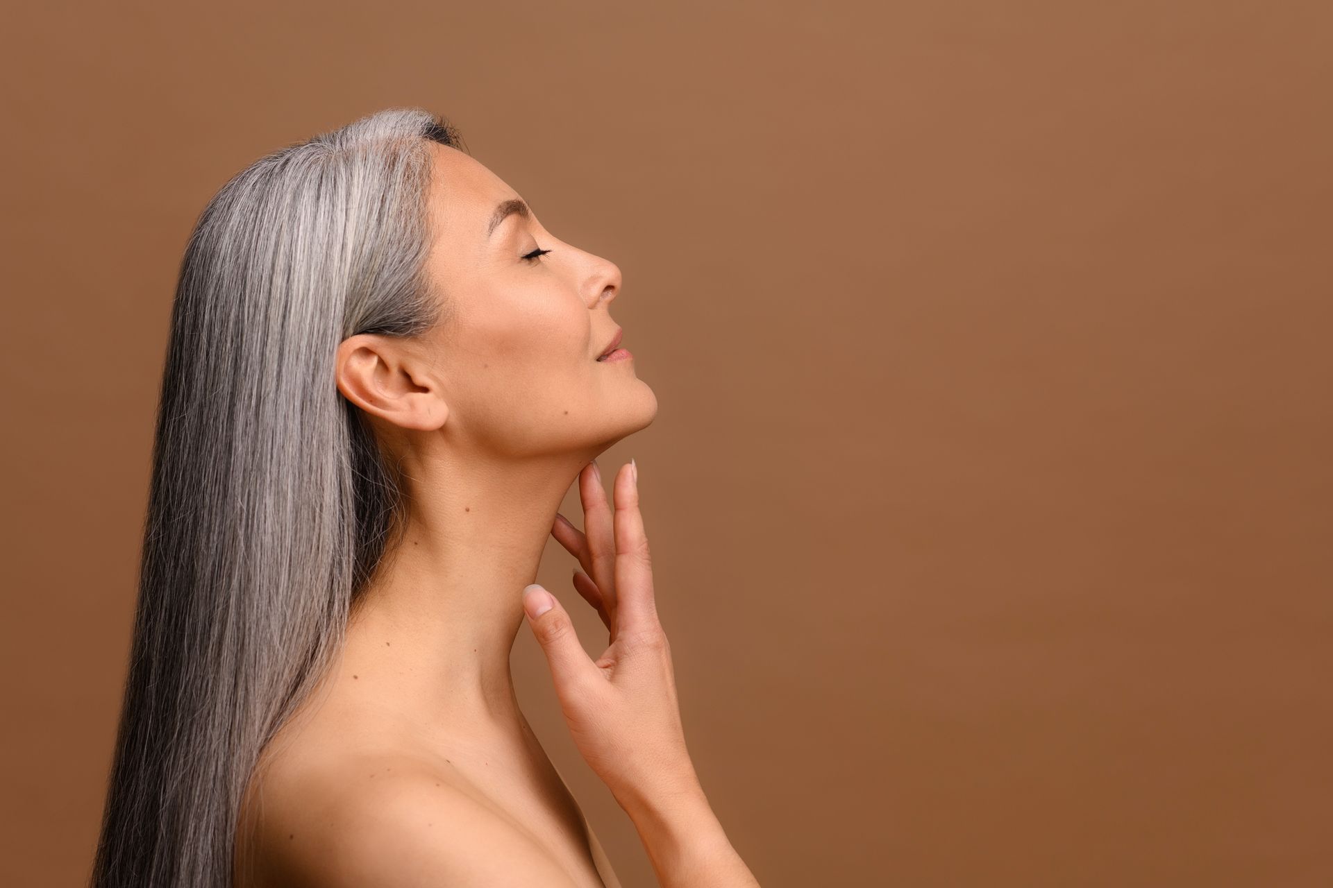middle aged woman side profile of neck