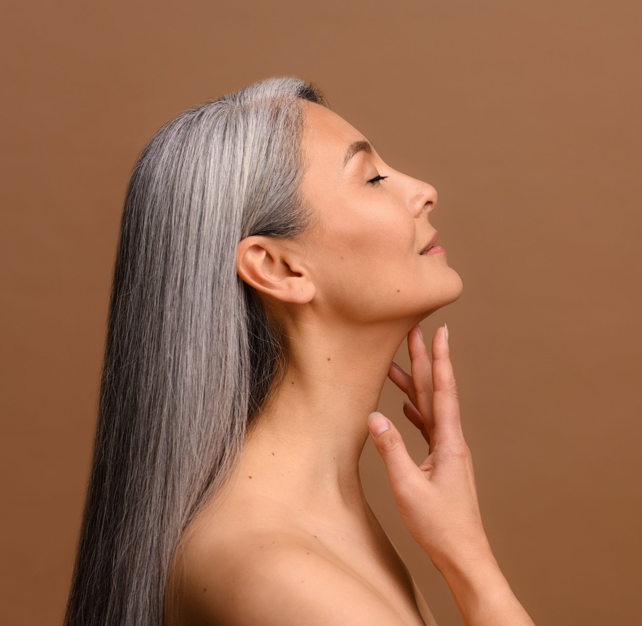 side profile of beautiful middle aged asian woman