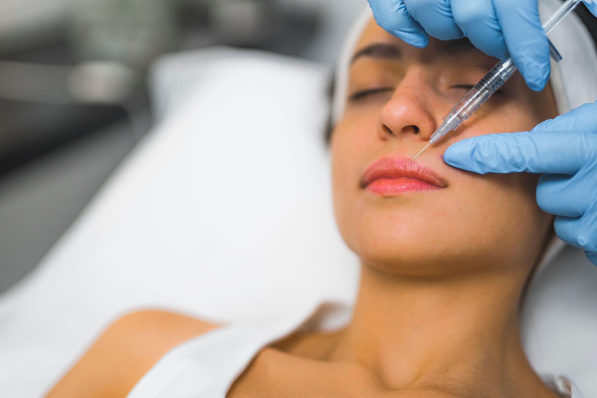 woman receiving dermal fillers