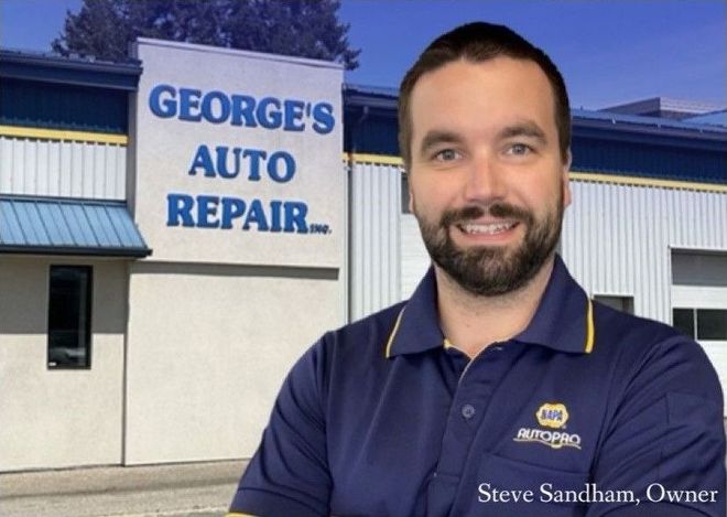 Couple Image of team | George's Auto Repair