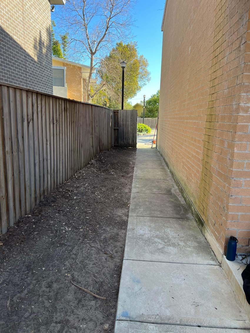 Before The Backyard Walkway Cleaning — Saving Time In Charlestown NSW