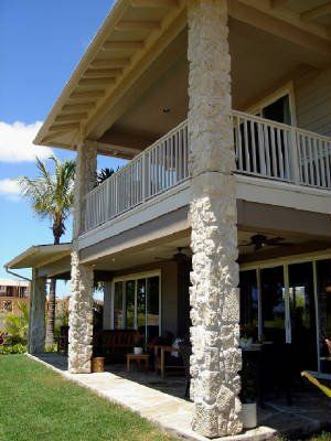 View of coral veneer stone wall pillar