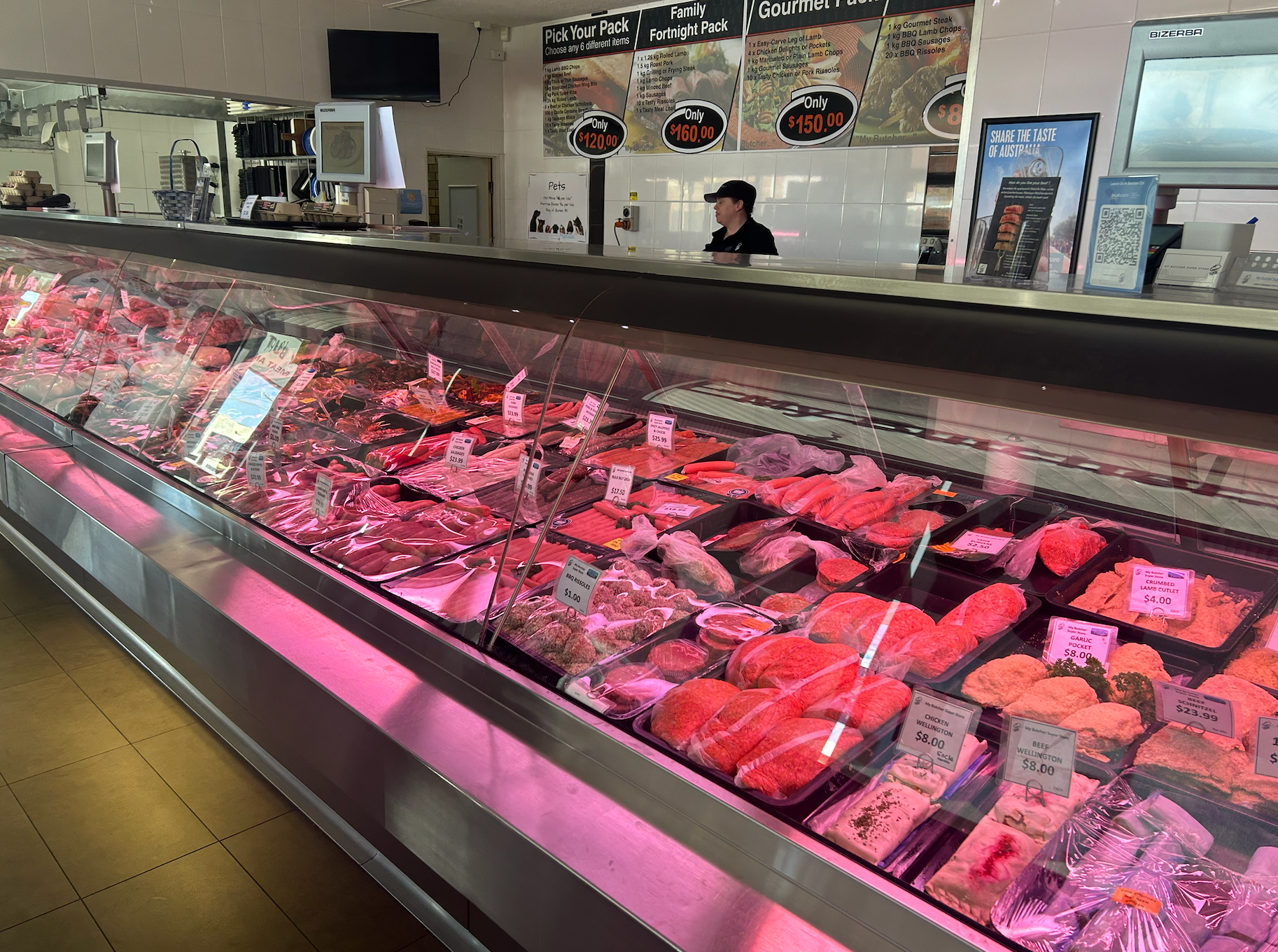 Raw chicken on a board with parsley — Butcher in Ballarat Central, VIC