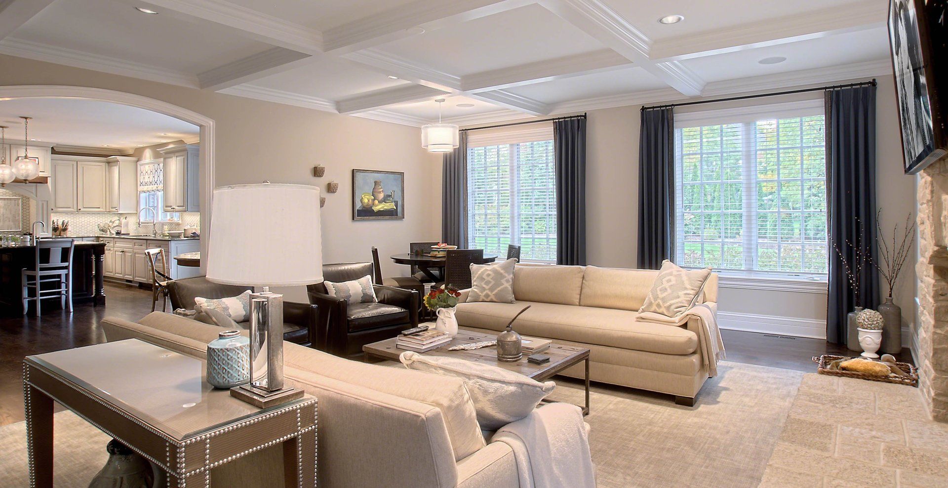 A living room filled with furniture and a fireplace.