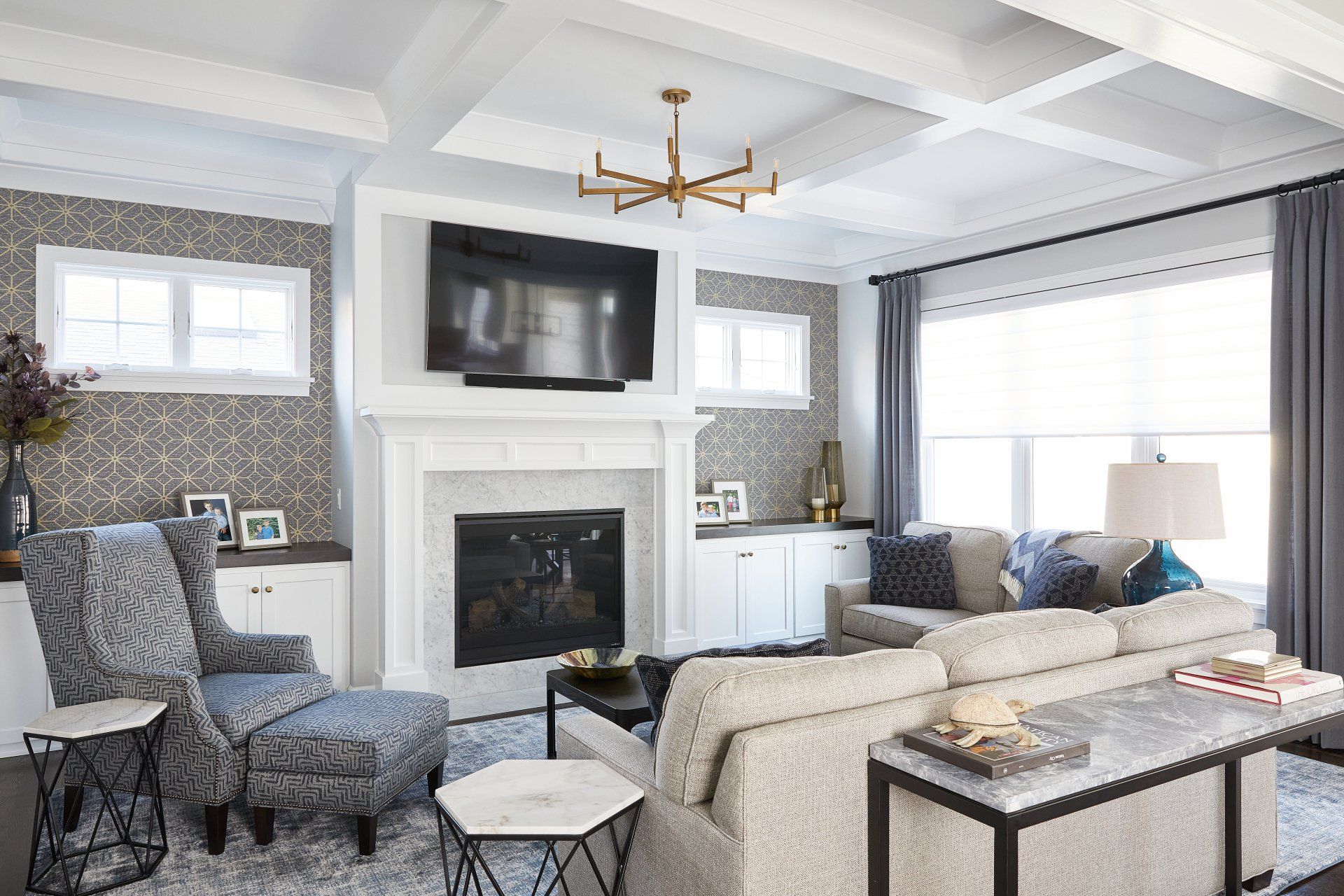 A living room filled with furniture and a fireplace.