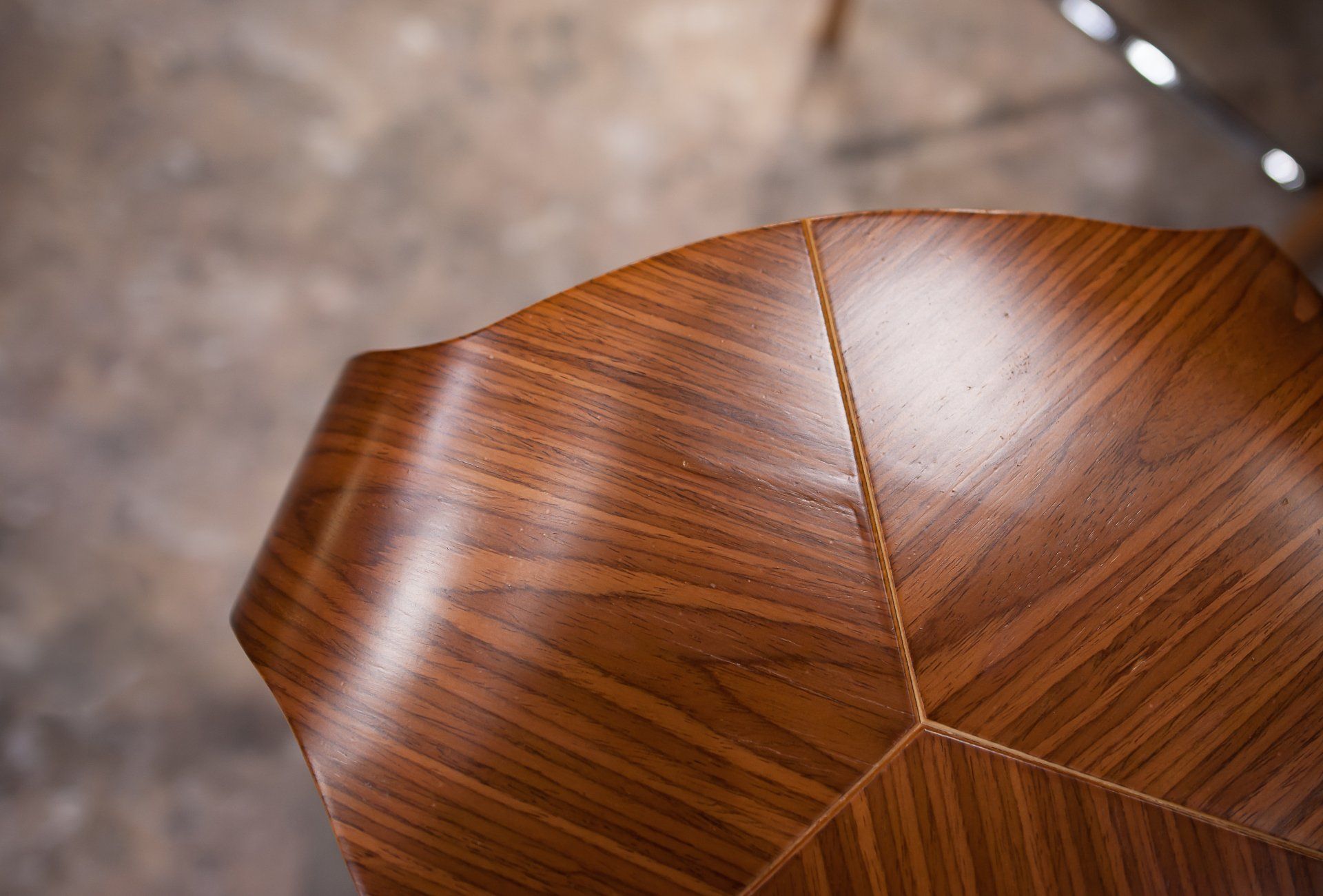 A close up of a piece of wood on a table.