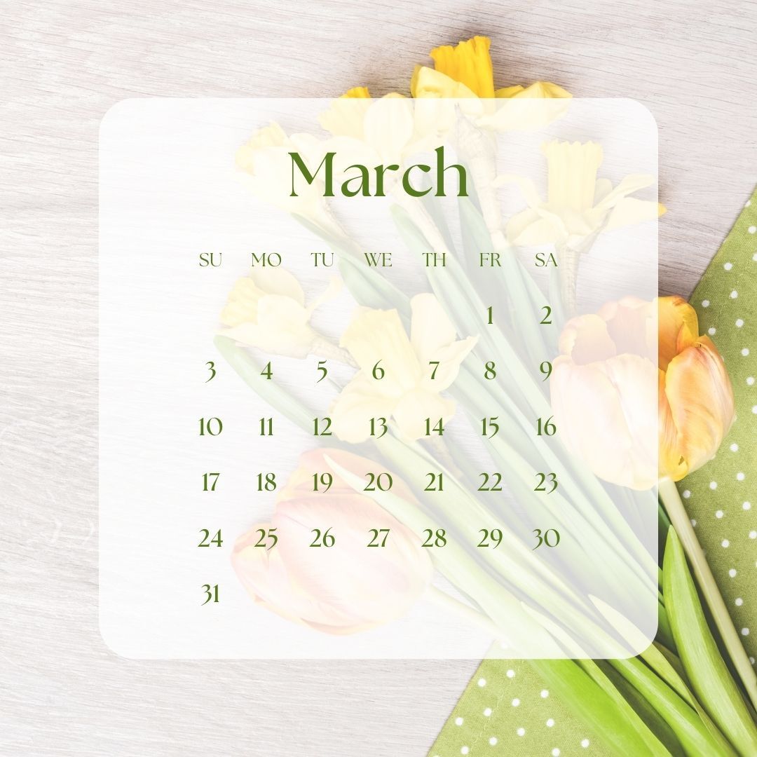 March calendar with yellow flowers on a light wood background.