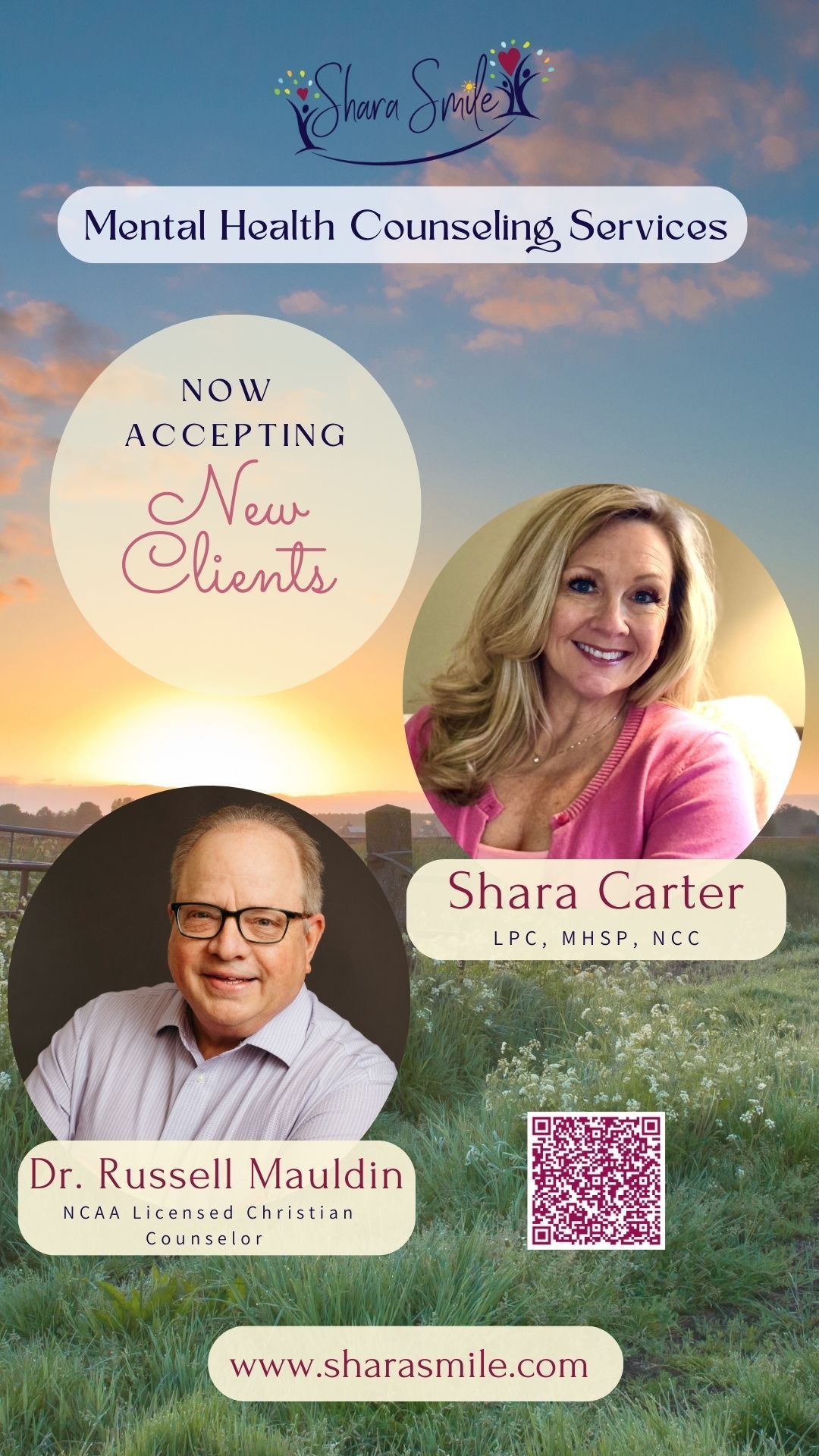 A woman in a pink shirt is standing in a field with a sunset in the background.